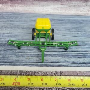 Ertl 1/64 scale John Deere folding seeder implement green/yellow diecast/plastic